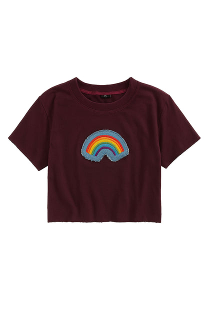Maroon t-shirt with a rainbow patch on a white background