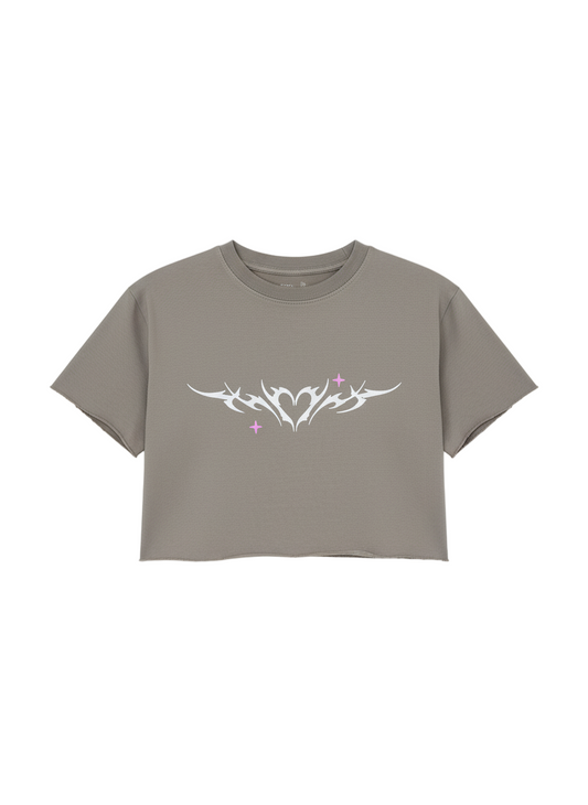 Gray crop top with a white tribal design on a white background